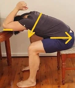 Lat Stretch While Sitting