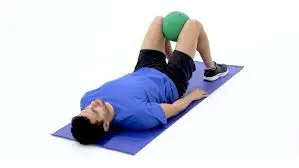 A supine ball adductor squeezes exercise