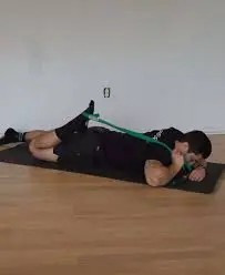 prone-quad-stretch-with-strap