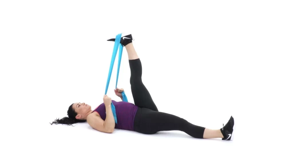 Lying hamstring stretch using a strap