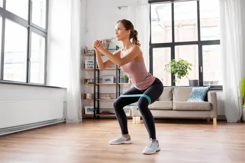 Resistance band squat