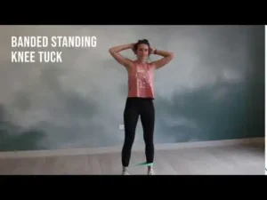 Banded Standing knee tuck